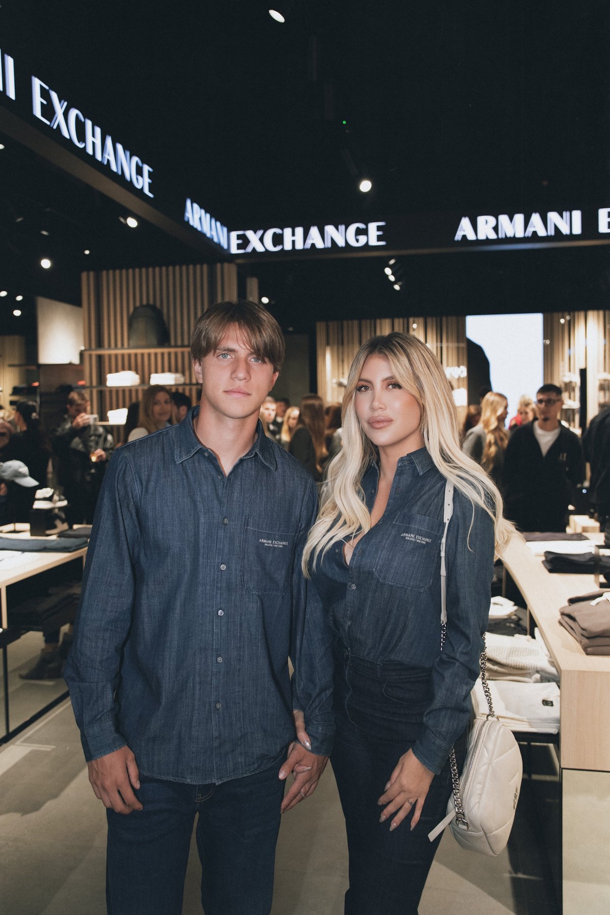 Wanda Nara and Valentino inside the Armani Exchange store at the opening
